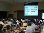 写真：報告会の様子1